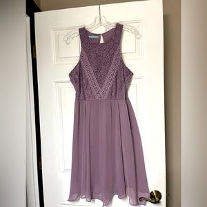 Women’s purple size medium dress.